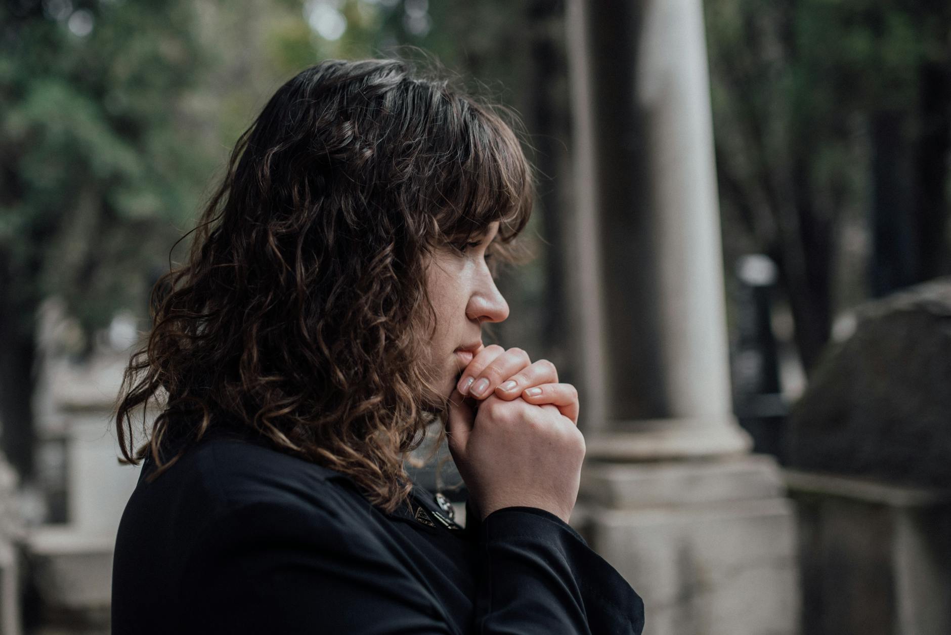brunette woman in cemetery